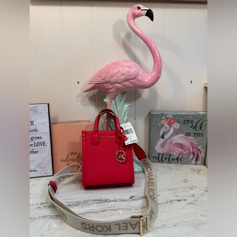 Michael Kors Retail $198 Maple Deep Pink with an original MK guitar straps